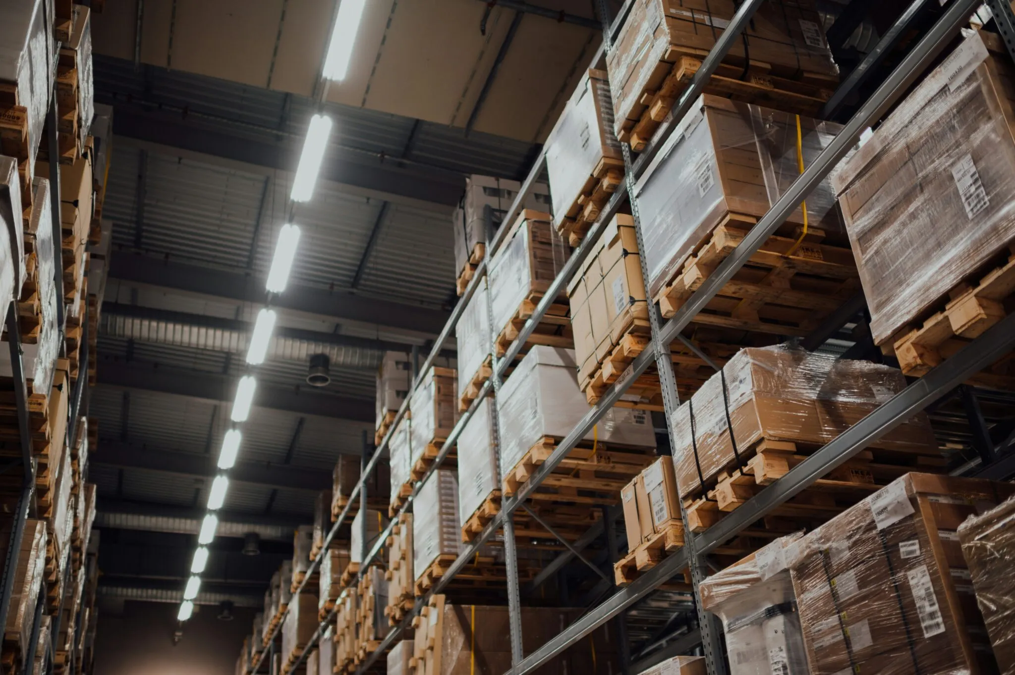 High racking inside a warehouse — the photography the Ironclad brand is built on